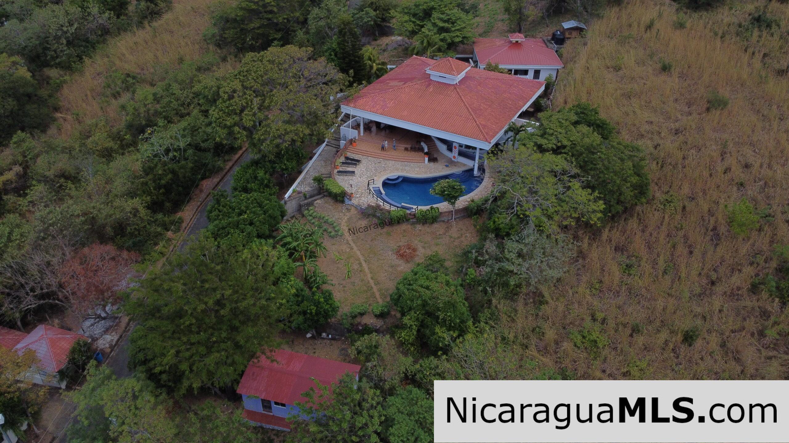 SOLD - Landmark entertainer home in a quiet, gated development mere minutes from town. - Image 20