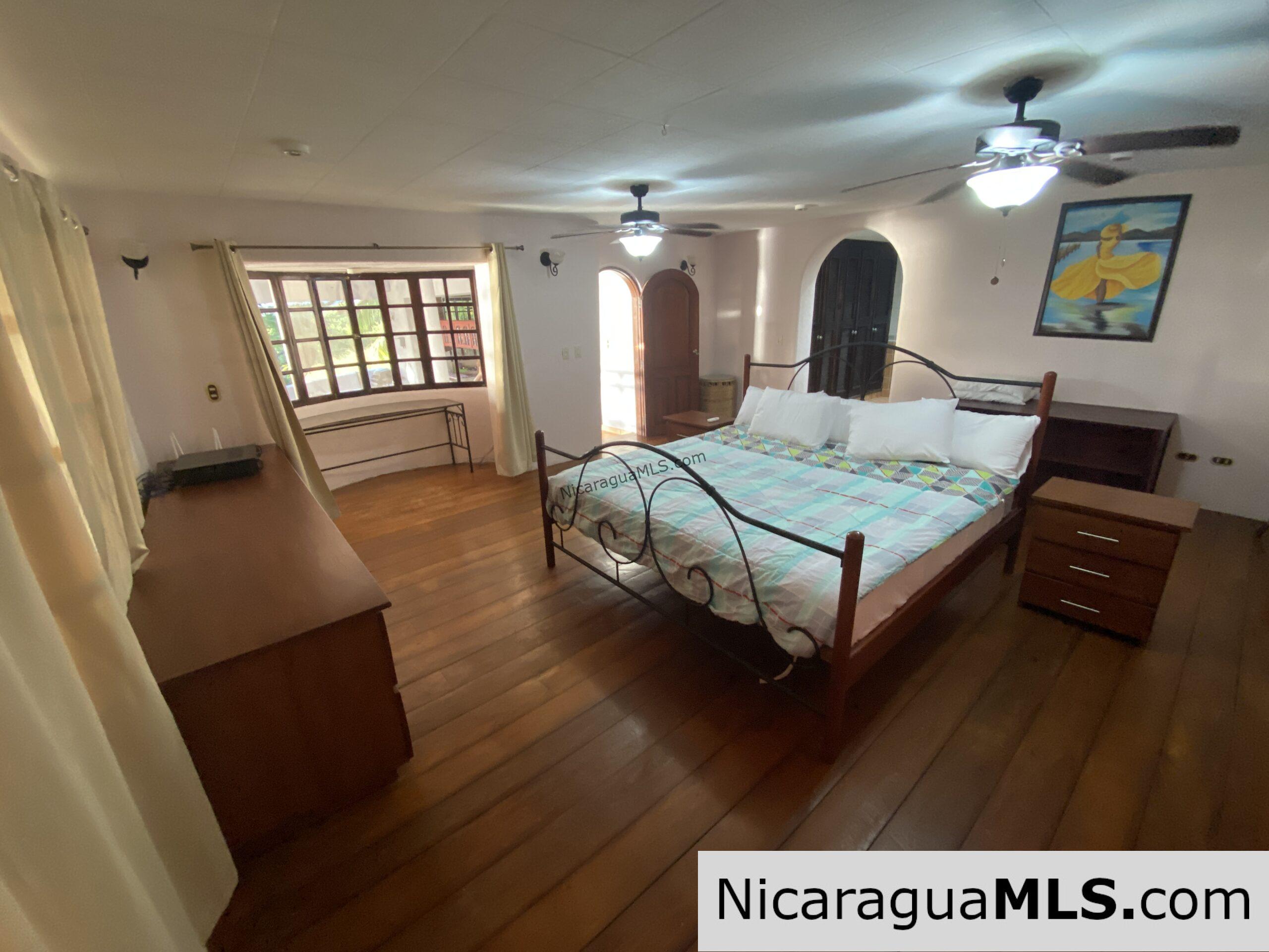 SOLD - Landmark entertainer home in a quiet, gated development mere minutes from town. - Image 8